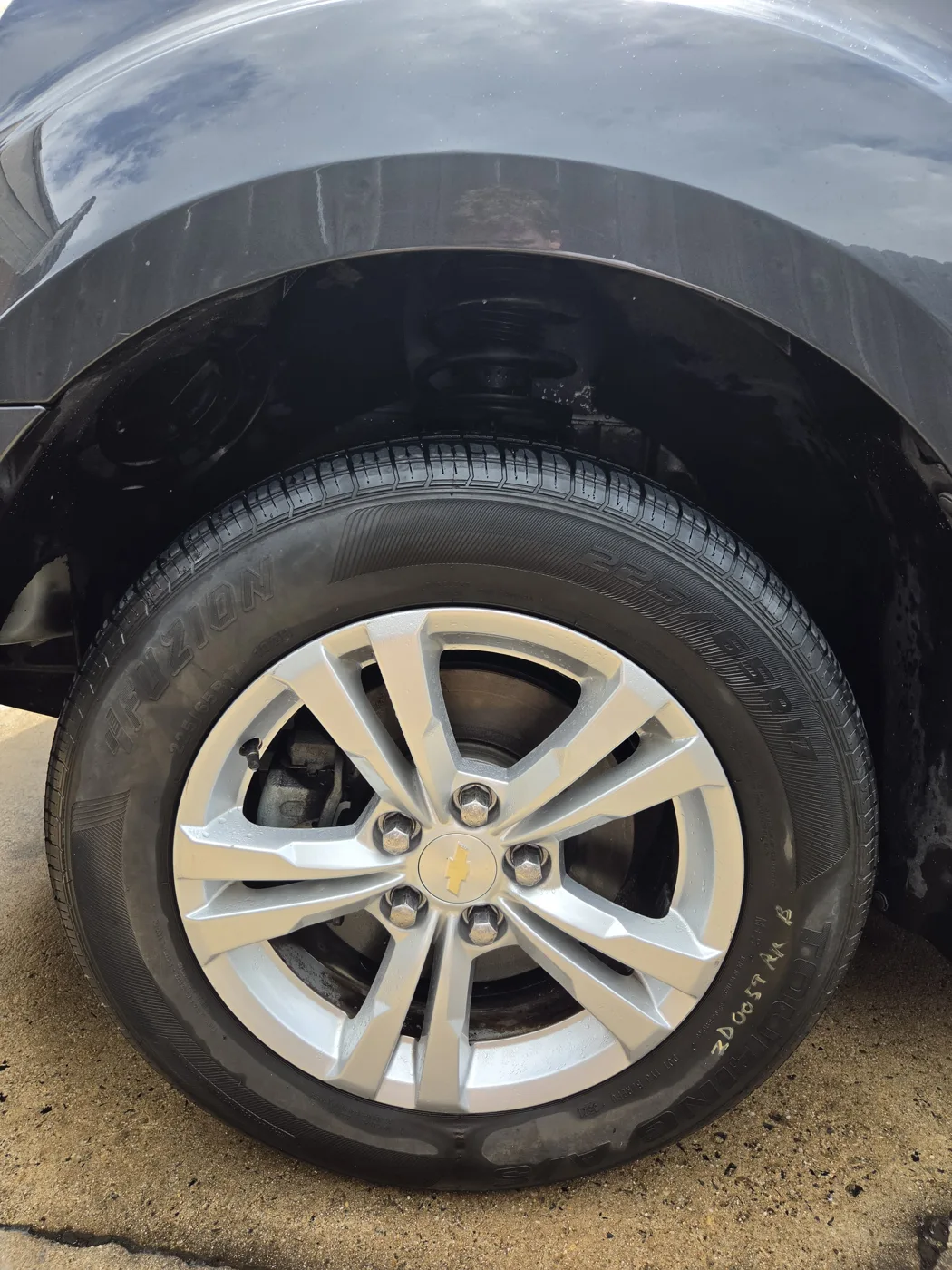 Detailed alloy wheel and tire, close up